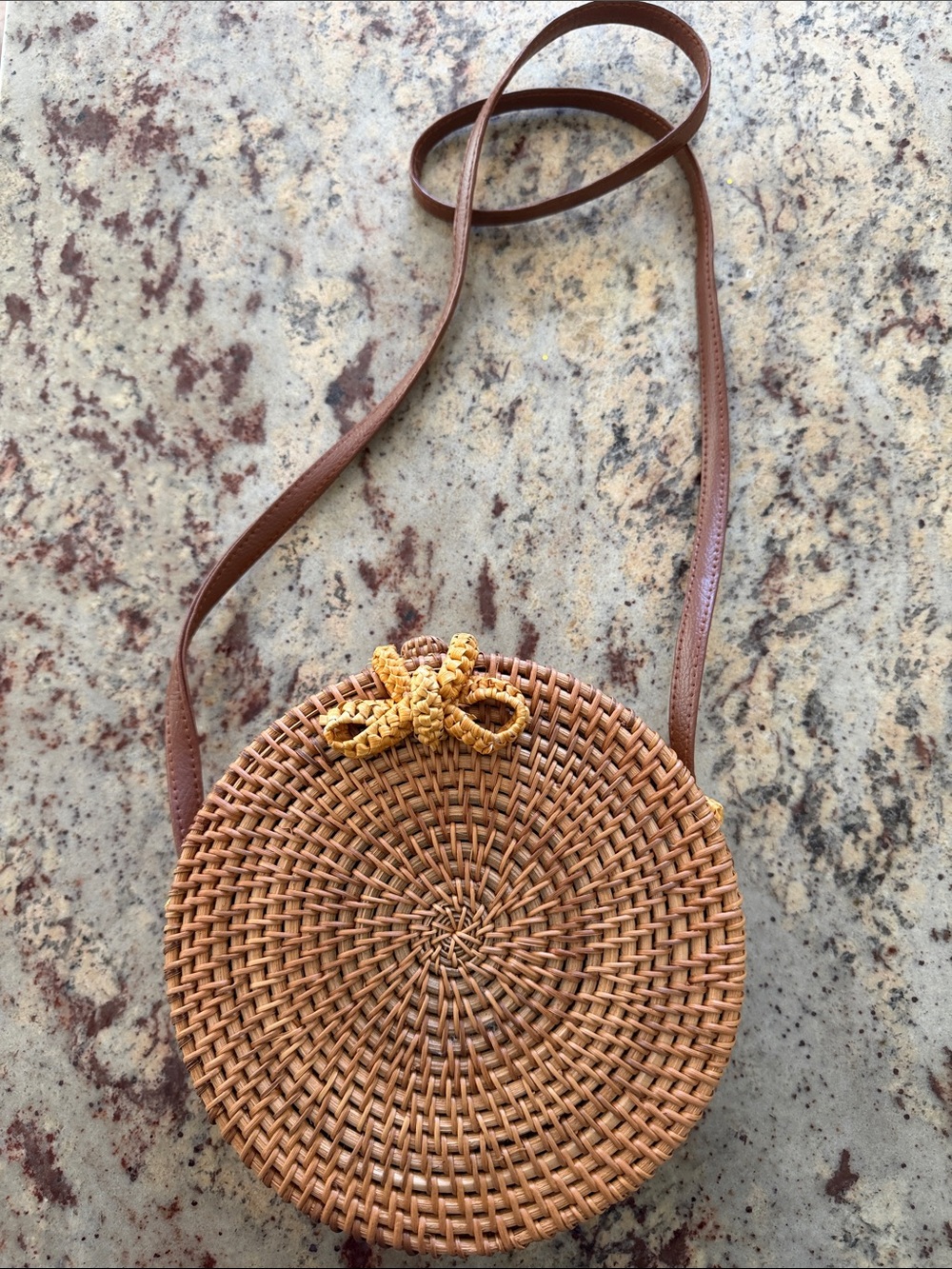 Round Woven Crossbody Bag in Brown with Bow Accent